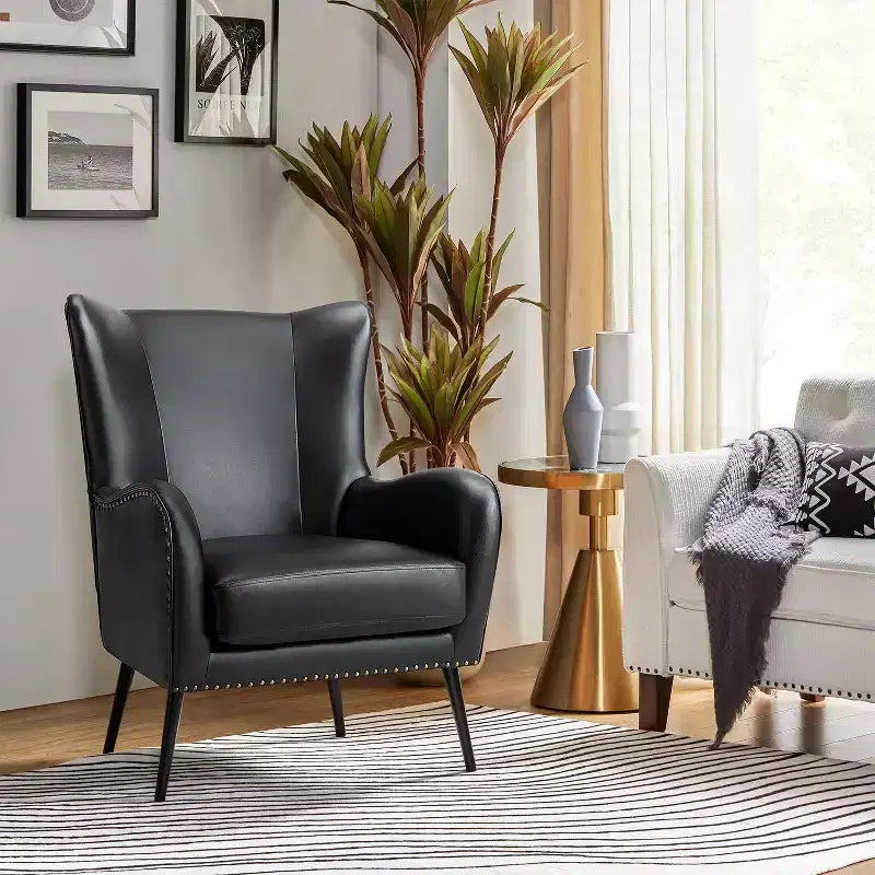 Harpocrates Classic Armchair with wingback and nailhead trim